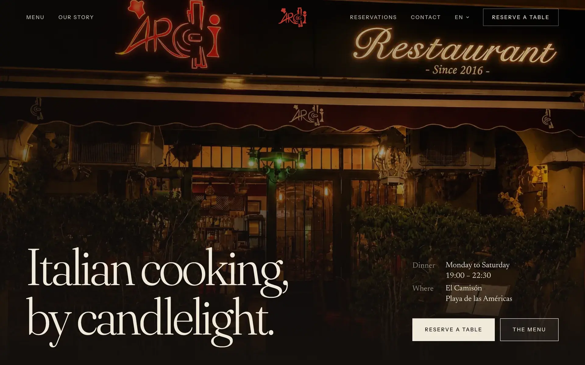 The ARDI website homepage on a desktop screen: the restaurant's illuminated entrance at night, with the heading Italian cooking, by candlelight, opening hours and a Reserve a table button.